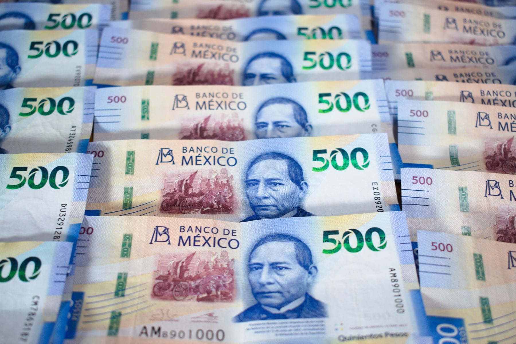 Mexican 500 peso banknotes fanned out on a flat surface