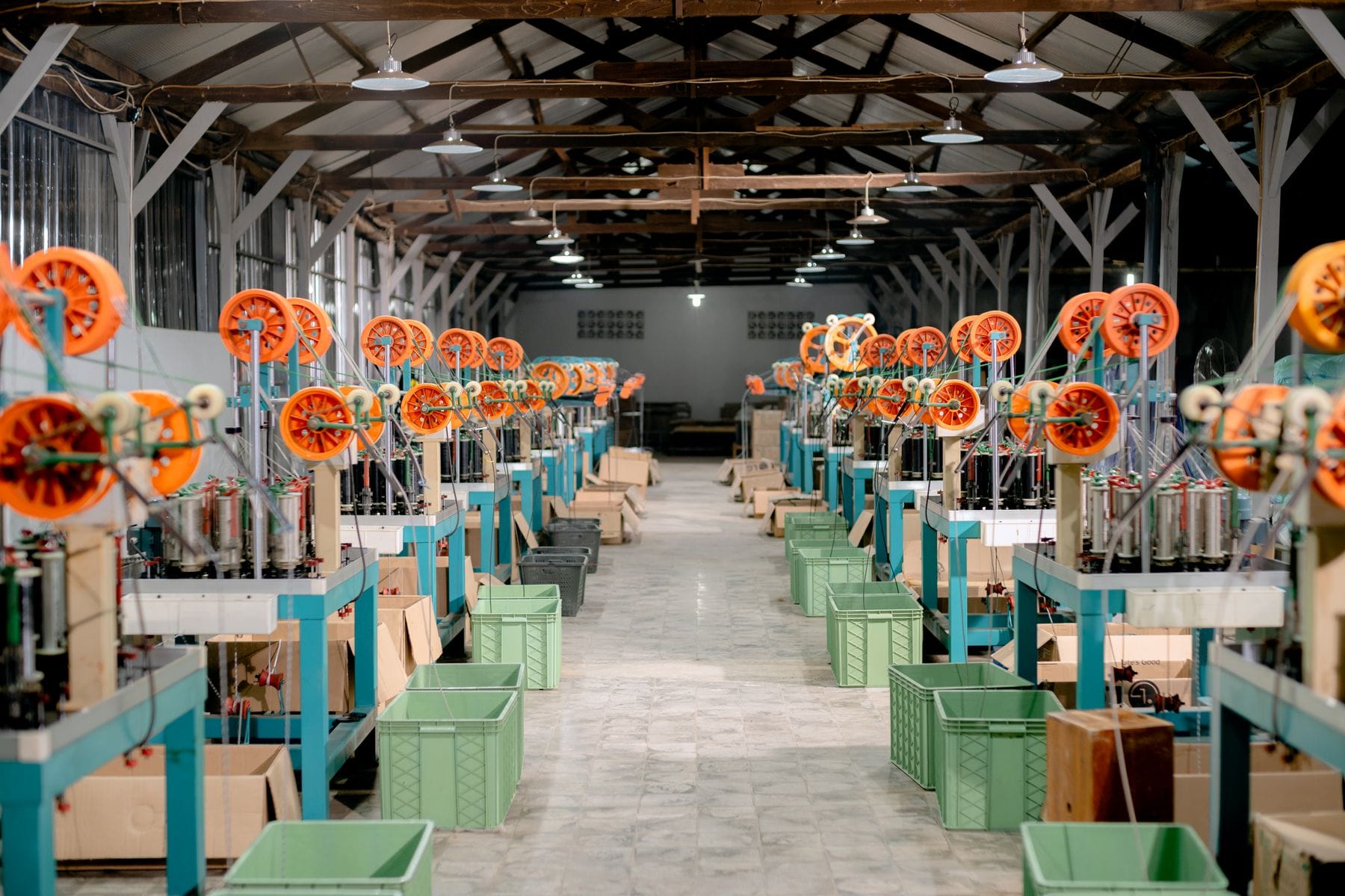Rows of spooling machines on a manufacturing floor
