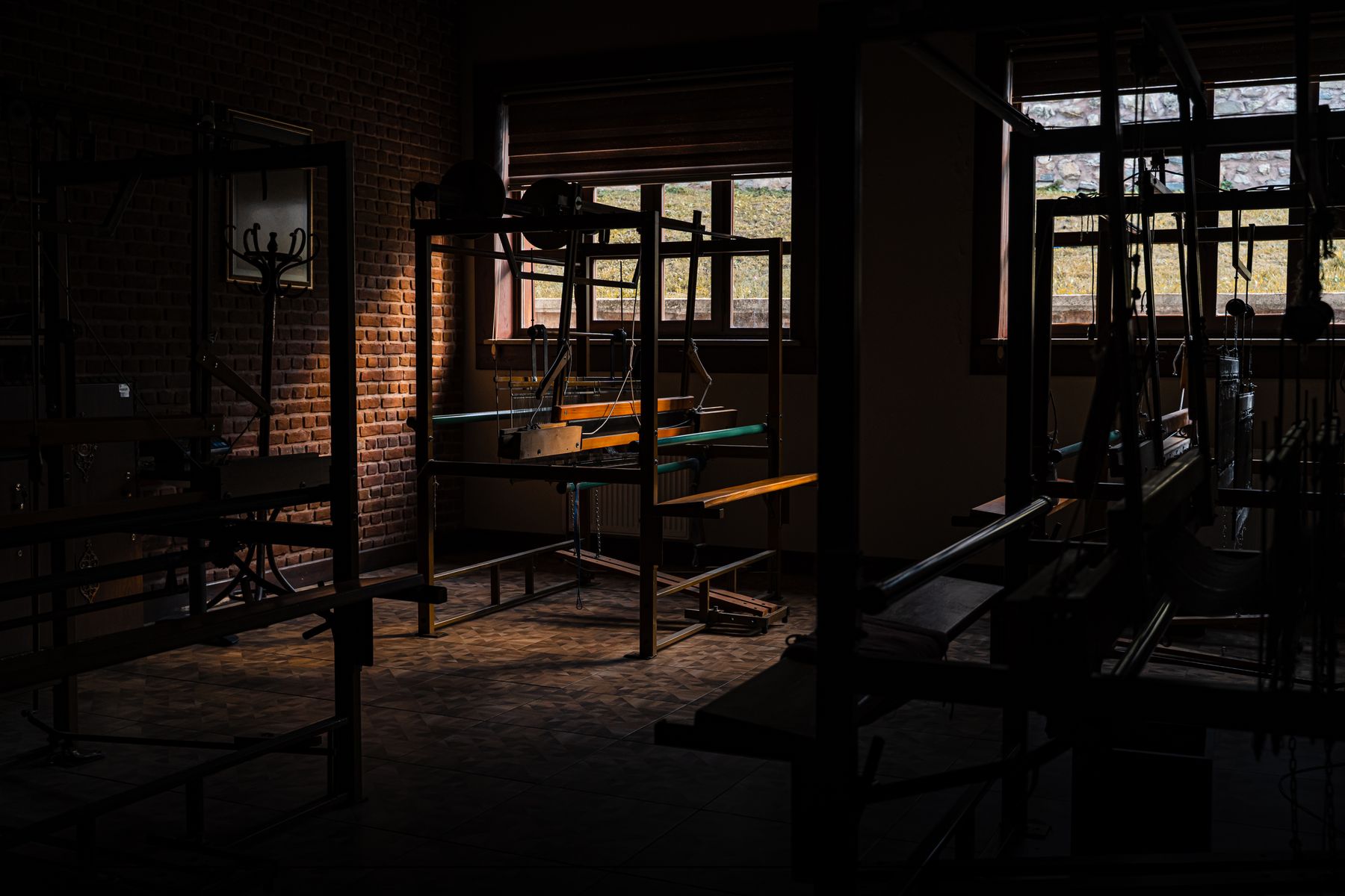 Dimly lit workshop with idle machinery at the end of a shift